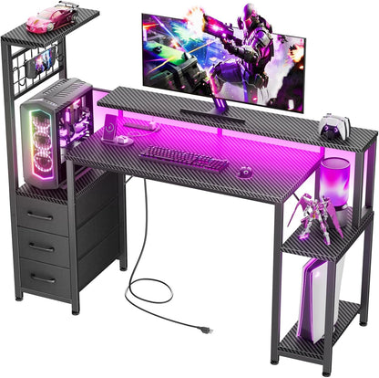 Korfile 48 Inch Gaming Desk with LED Lights & Power Outlets,Computer Desk with Fabric Drawers & Side Hook,Reversible Gamer Table with Monitor Stand for Game Room,Home Office,Carbon Fiber Black