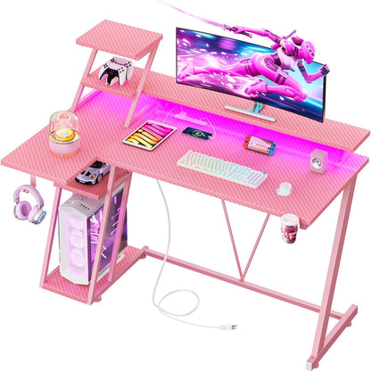 Korfile 47 Inch Pink Gaming Desk with LED Lights & Power Outlet, Gaming Computer Desk with Storage Shelves, L Shaped Gamer Workstations with Monitor Stand for Bedroom