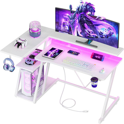 55 Inch Gaming Desk with Power Outlet & LED Lights, L Shaped Computer Gaming Table with 3 Tiers Storage Shelves, Corner Gamer Desk with Monitor Stand for Small Space, White