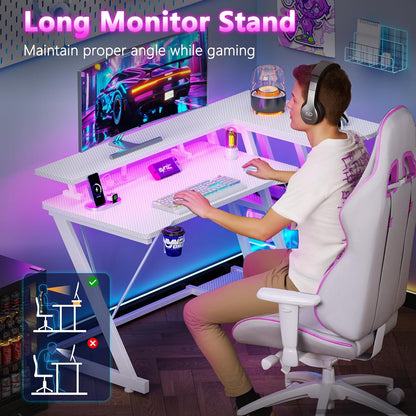 55 Inch Gaming Desk with Power Outlet & LED Lights, L Shaped Computer Gaming Table with 3 Tiers Storage Shelves, Corner Gamer Desk with Monitor Stand for Small Space, White