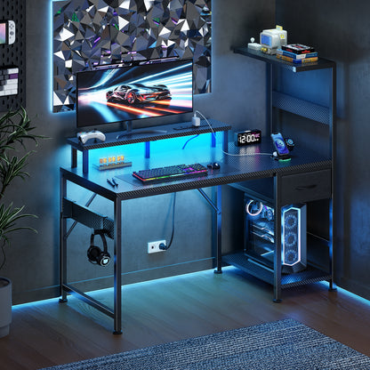 Korfile 48" Gaming Desk with Power Outlets, LED, Carbon Fiber Black Finish
| 220-lb Load Capacity, Zero Wobble, Reversible Computer Desk with Monitor Stand, CPU Stand, Side Hooks, Also for Home Office